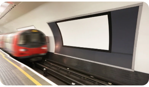 Photo of the London Underground arriving at a station.